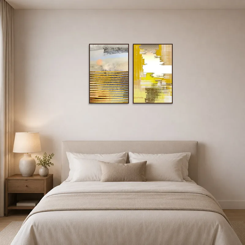 Gold and earth-toned textured abstract artwork enhances the calming ambiance of a bedroom.