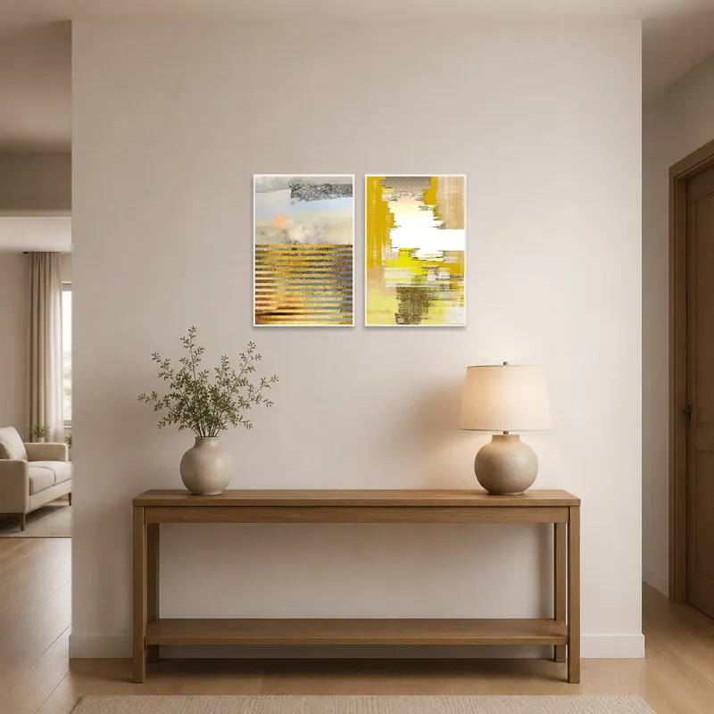 A set of abstract pieces with textured gold and earth tones greets visitors in the entrance hall.