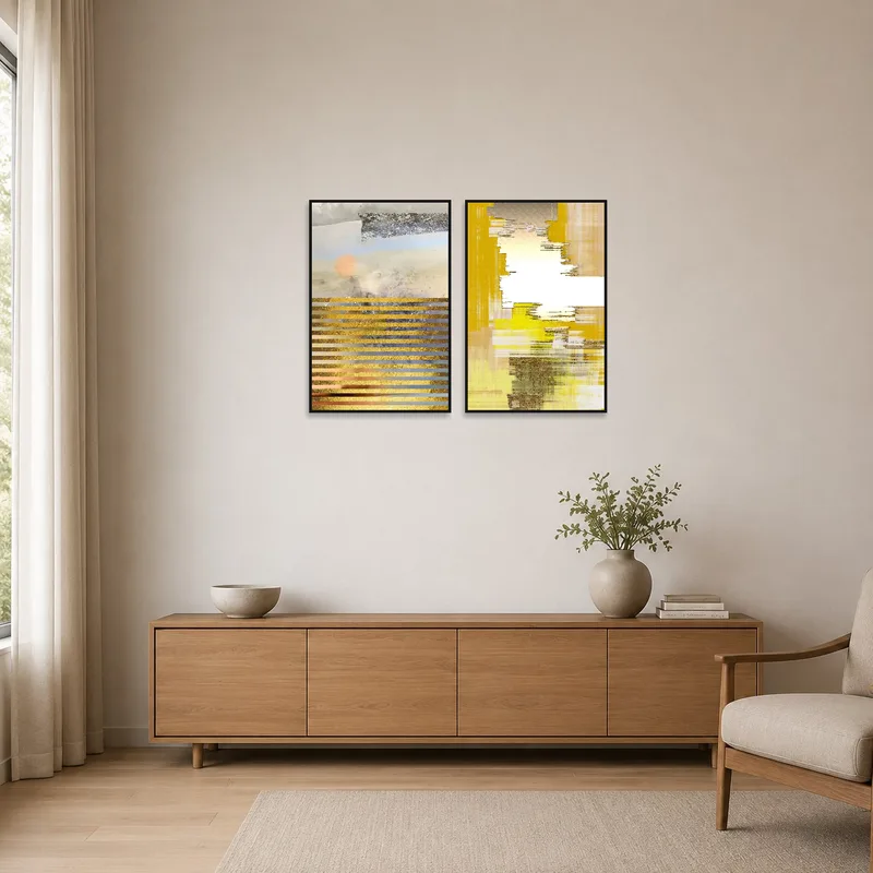 A textured abstract set with gold and earth tones complements the clean lines of a minimalist space.