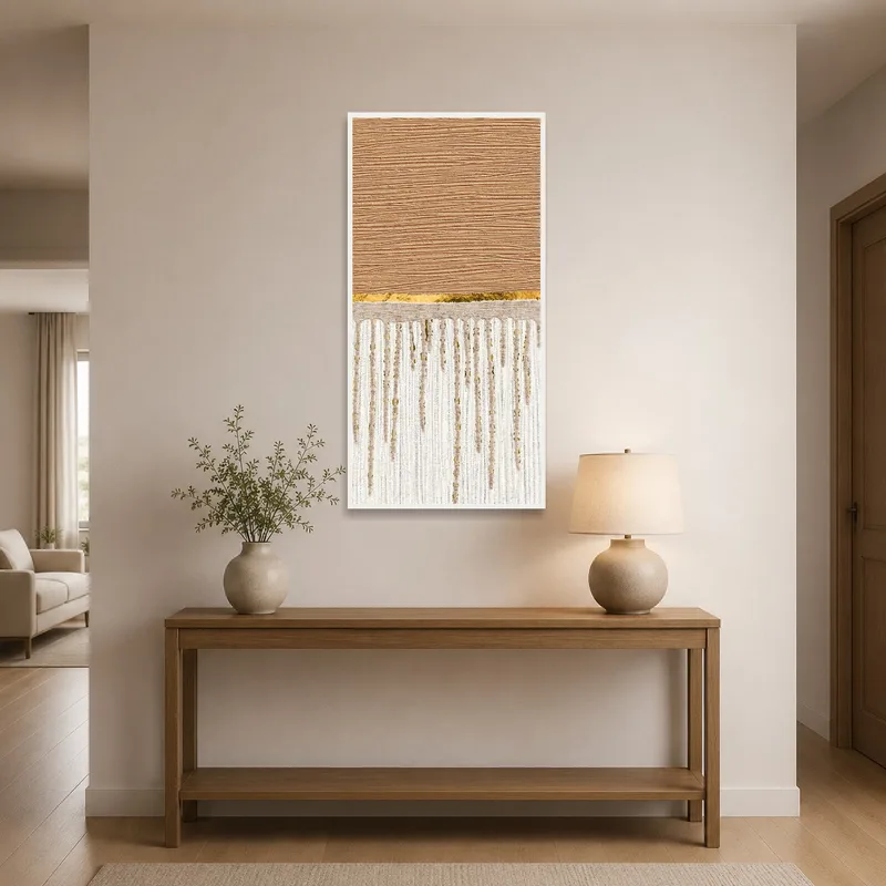 Entrance hall adorned with textured abstract art in earthy shades.