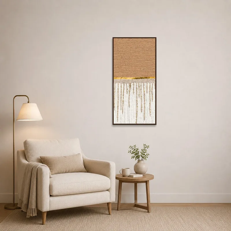 Reading corner featuring earthy-toned abstract canvas on the wall.