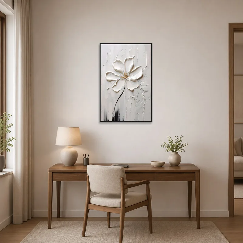 White blossom artwork inspiring creativity in a home office.
