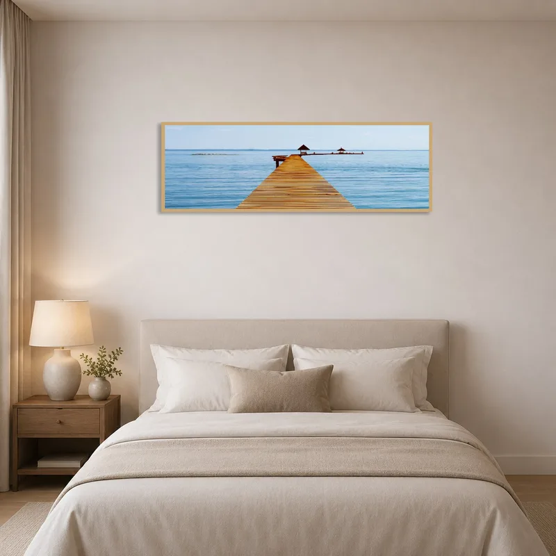 A soothing pier scene adds tranquility to the bedroom.