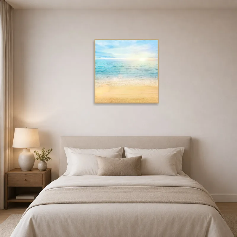 Seascape at sunrise adds peace to a serene bedroom.