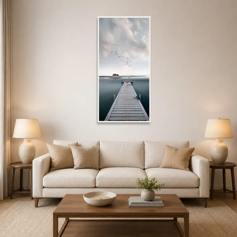 Artwork of a serene pier and birds hanging in a cozy living room setting.