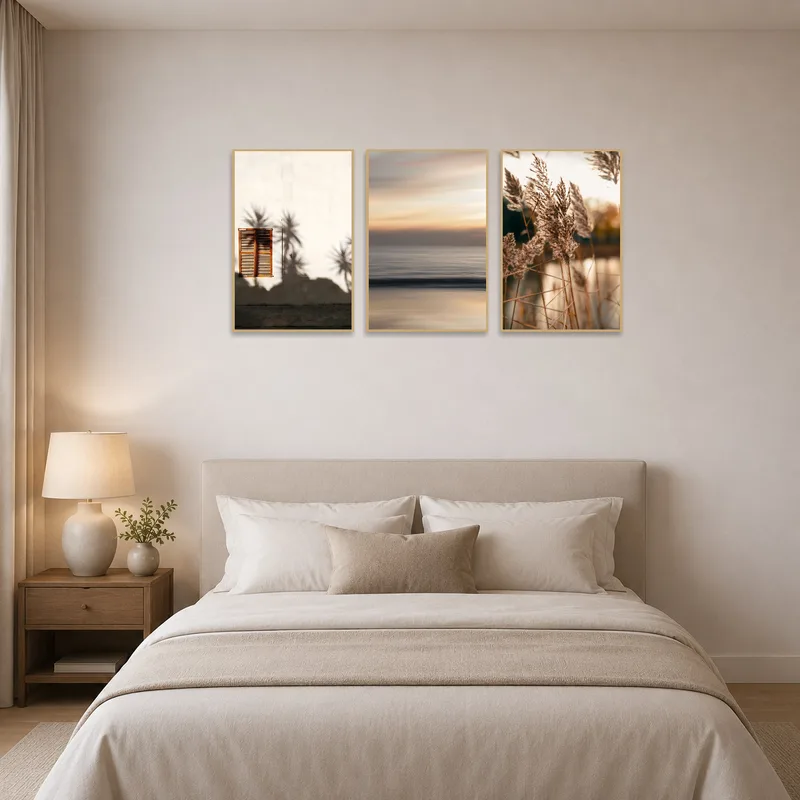 Bedroom decor with a triptych set of tranquil shadowy landscapes.