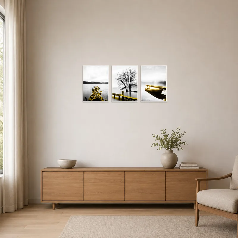 Monochrome and yellow triptych enhances the simple lines of the minimalist room with a sleek water theme.