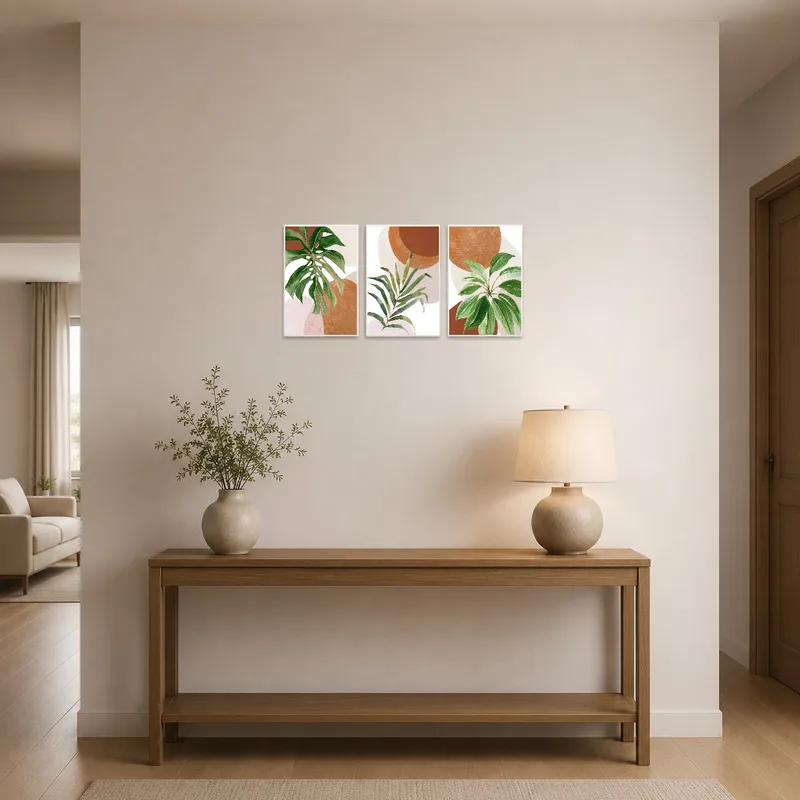Entrance hall featuring a tropical botanical art set greeting visitors with lush green tones.