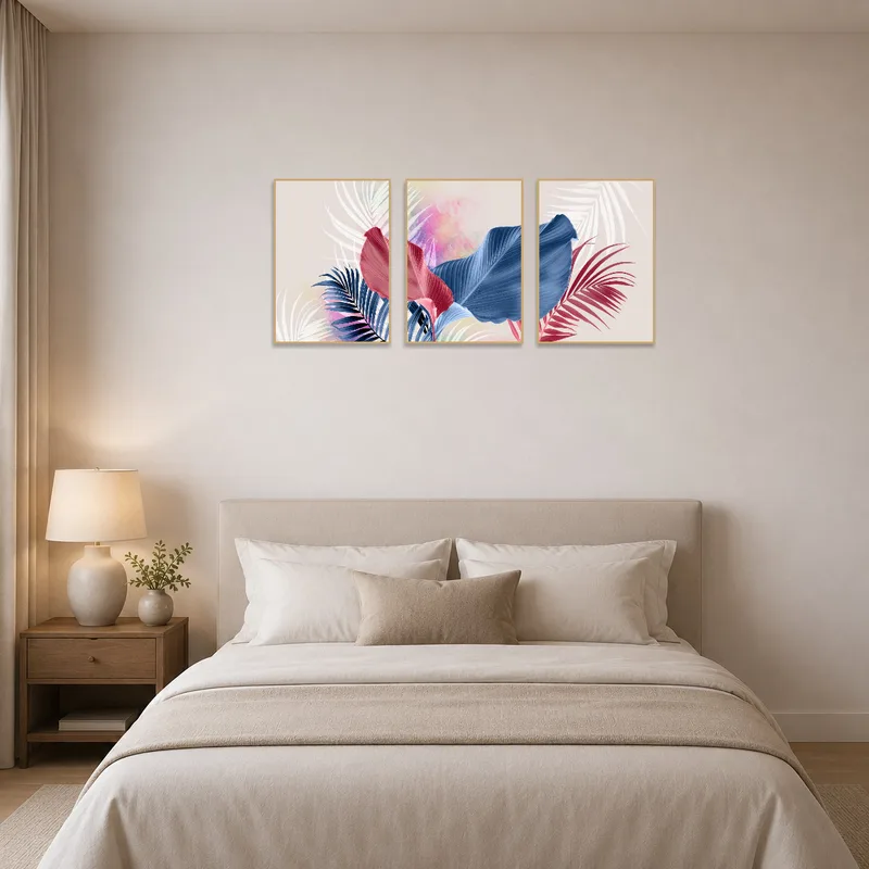 Bedroom wall displaying a botanical triptych set, infusing a calming tropical theme.