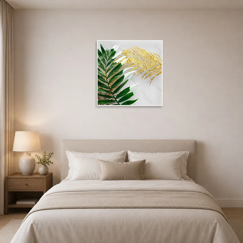 Bedroom adorned with tropical leaf artwork in green and gold tones.