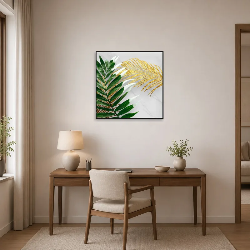 Home office wall displaying art of sophisticated green and gold leaves.