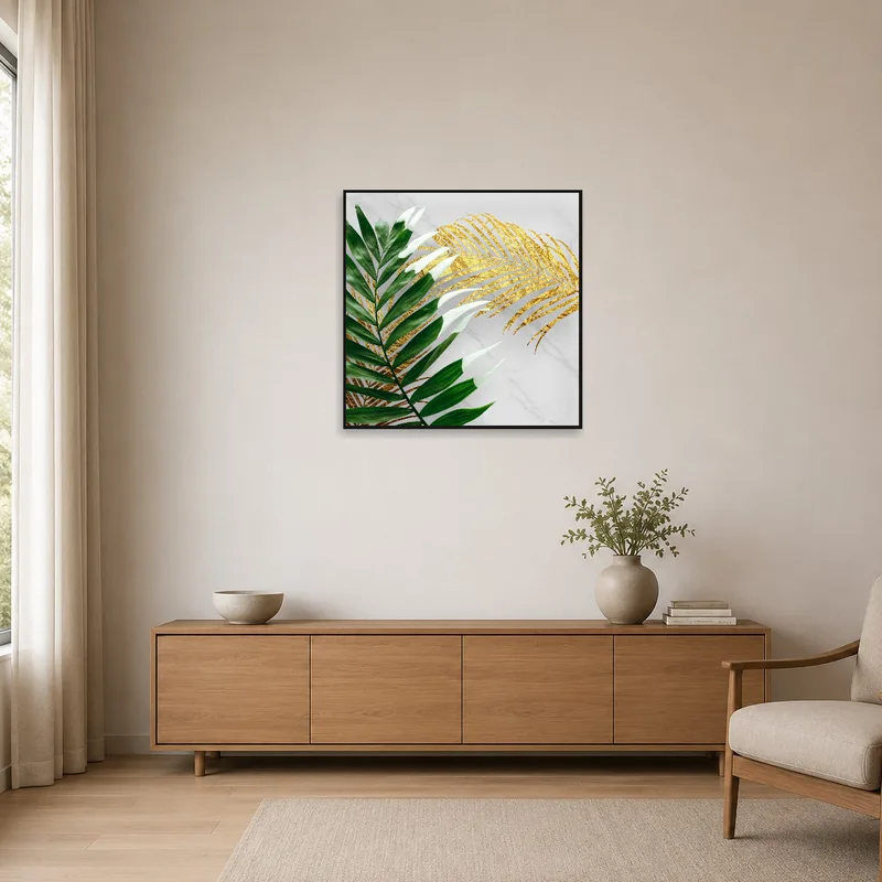 Minimalist room showcasing art of elegant green and gold leaves.