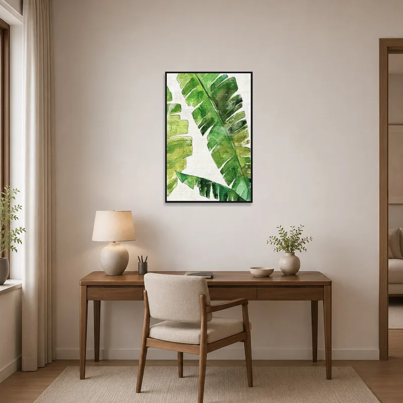 Home office wall embellished with tropical banana leaves artwork.