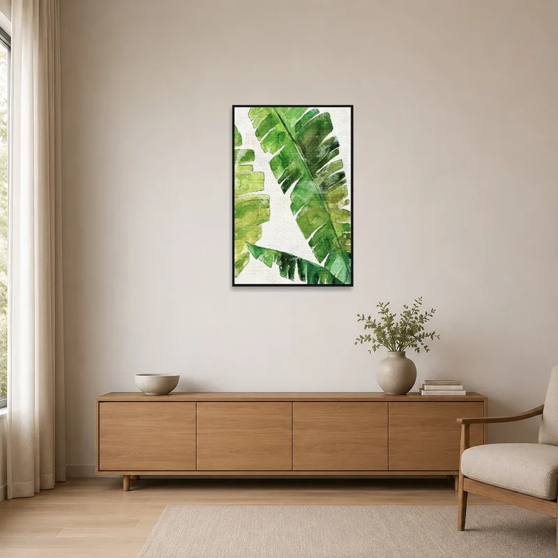 Minimalist room highlighted by banana leaves watercolor artwork.