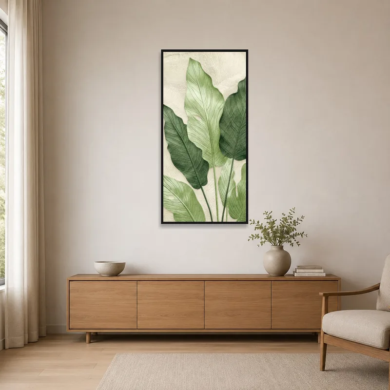 Minimalist room with a tropical green leaf botanical print on a clean, white wall.