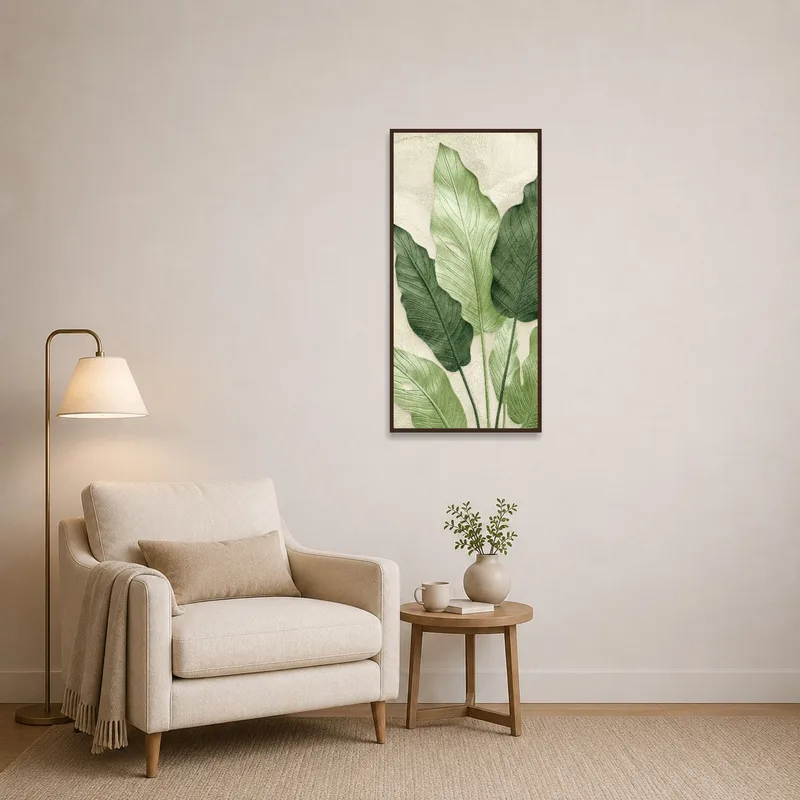 Tropical green leaf botanical print adds a touch of nature to a cozy reading corner.