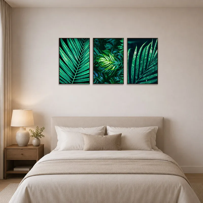 Triptych of tropical leaf textures enhancing the tranquility in a bedroom setting.