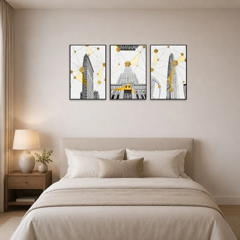 Triptych with gold details elegantly complements a serene bedroom setting.