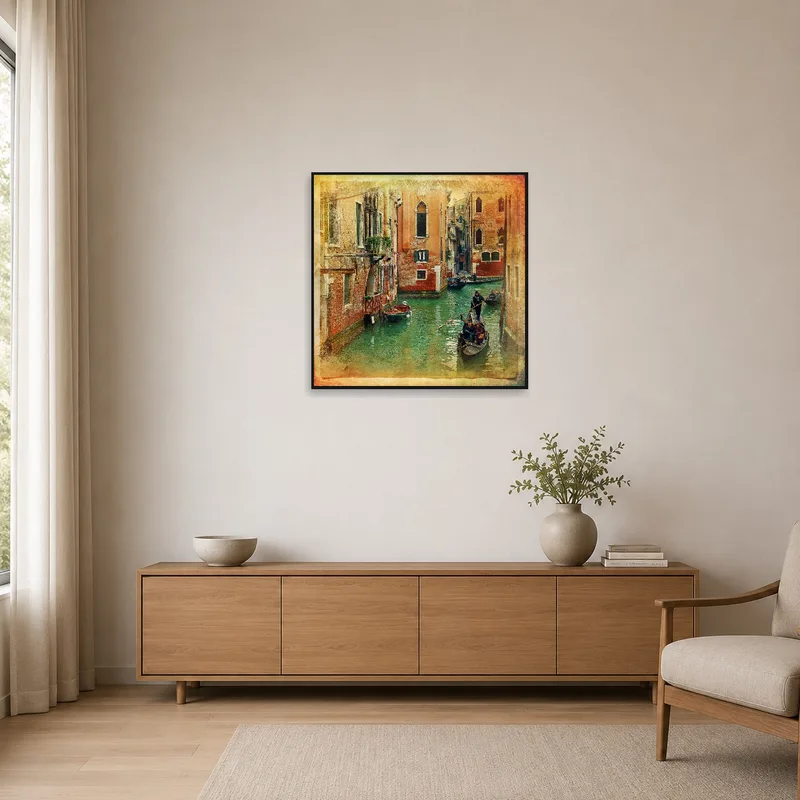 A vibrant canal artwork adds color to a minimalist white room.