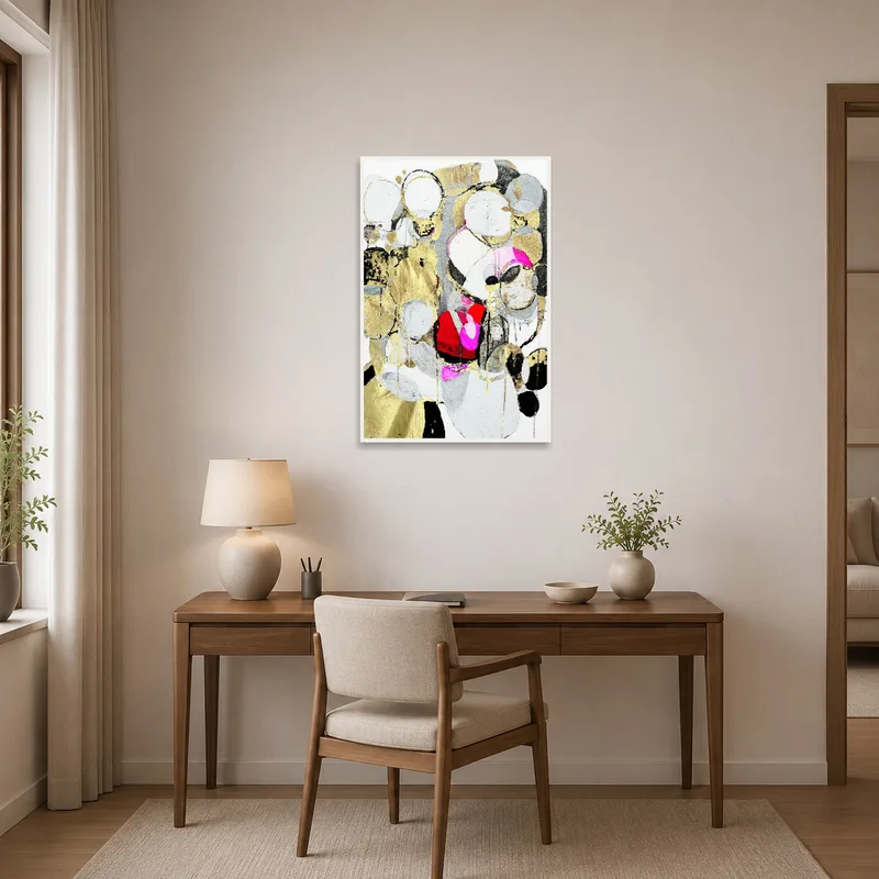 Lively abstract artwork with gold highlights displayed in a home office for a creative vibe.