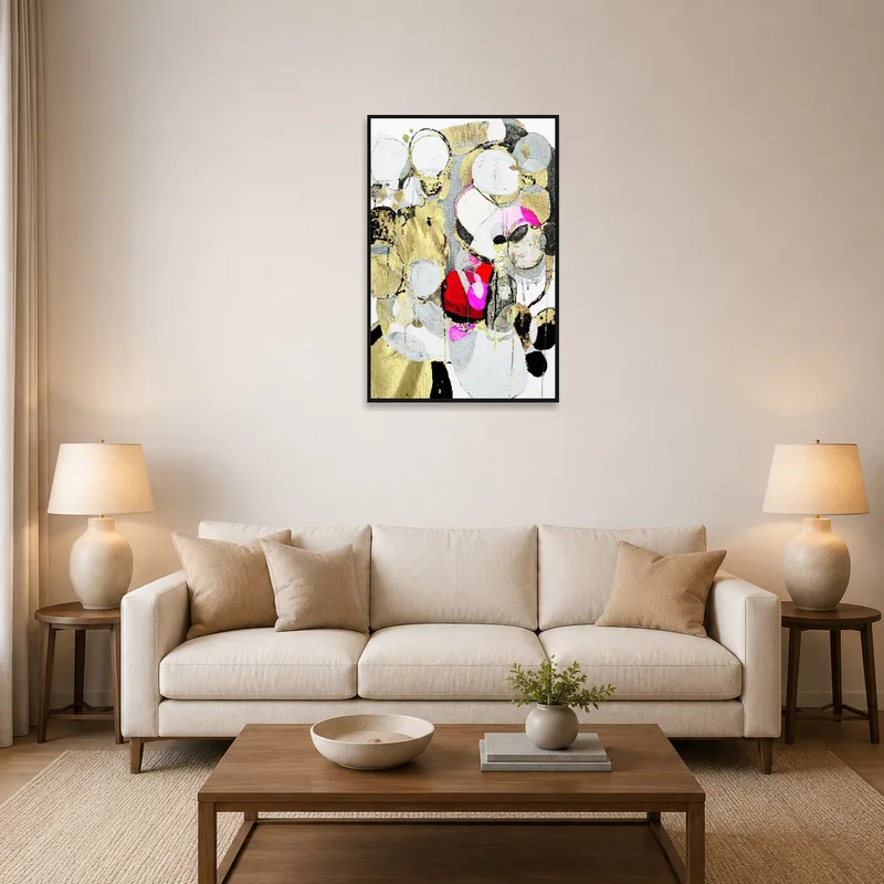 A vibrant abstract art piece with gold accents on the living room wall, adding a lively touch.