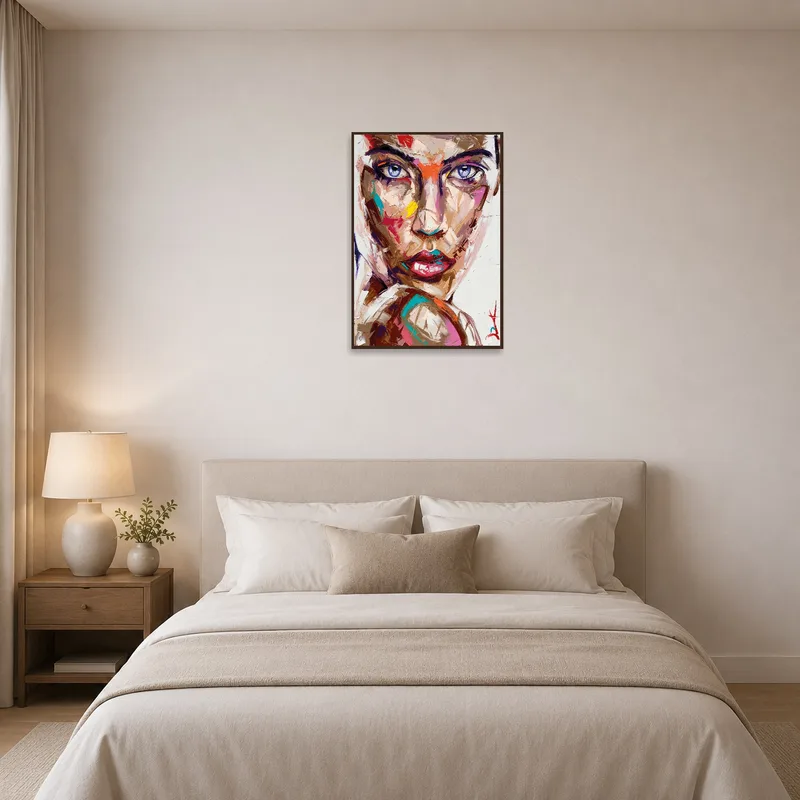 Bold abstract portrait providing an eye-catching focal point above the bed in the bedroom.