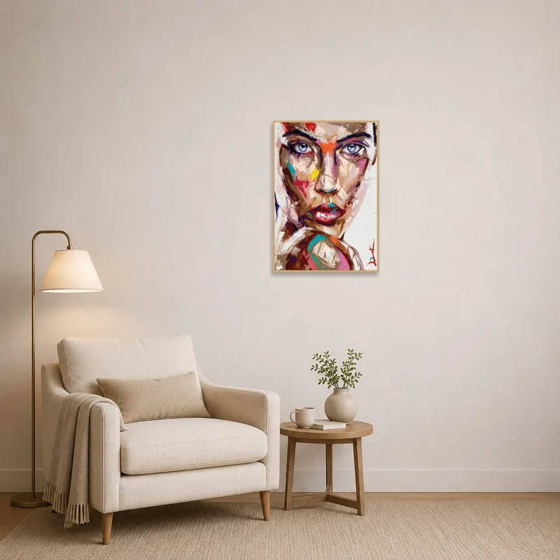 Vibrant abstract portrait study energizes a cozy reading corner decorated with warm lighting.