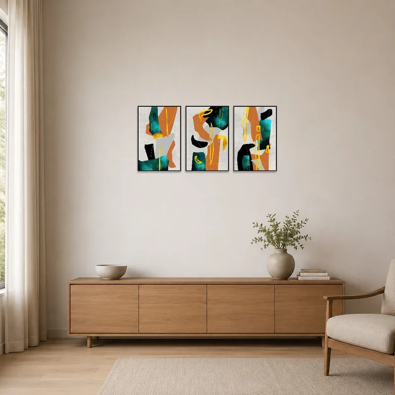 Abstract triptych with earthy tones enhances a minimalist space, adding color to the white walls.