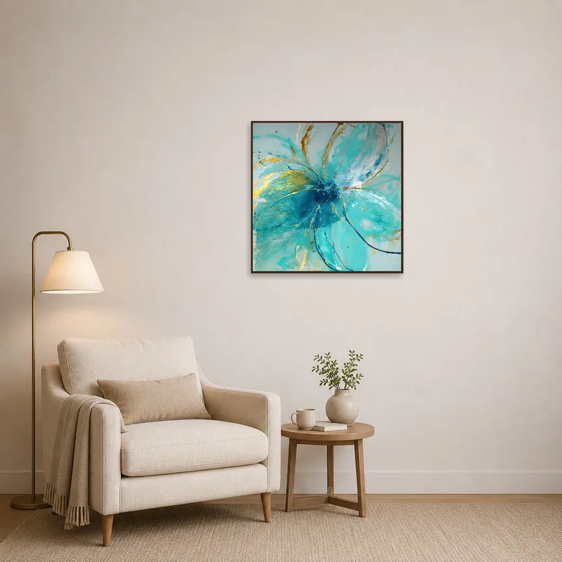Turquoise abstract blossom art in a cozy reading corner.