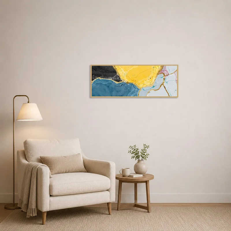 Gold-accented vibrant abstract art enhancing a cozy reading corner with a comfortable chair.