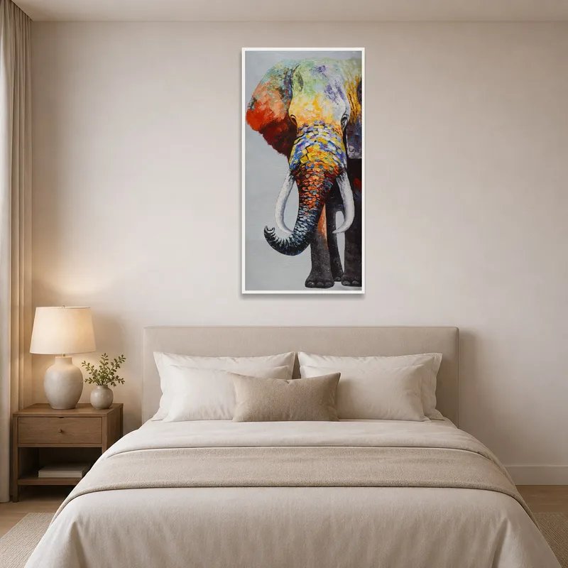 Vibrant abstract elephant piece above a stylish bedroom nightstand.