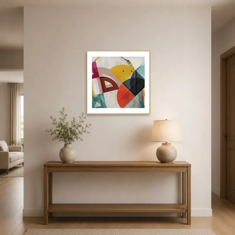 An eye-catching geometric piece greets visitors in the entrance hall, set against neutral walls.