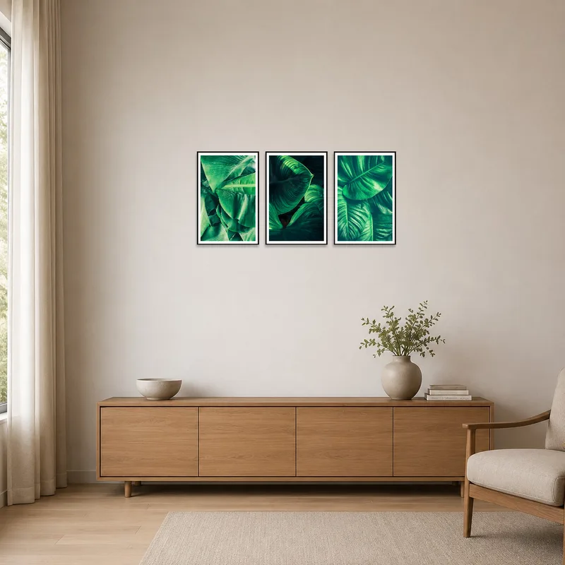 Vibrant green leaf triptych adding color to a minimalist space.