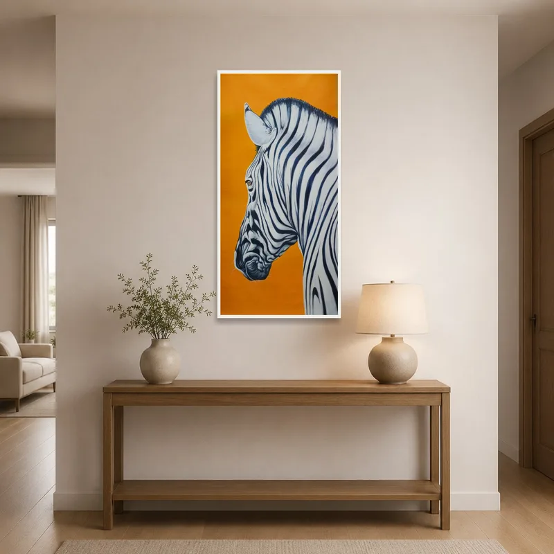 A striking zebra portrait on orange welcomes guests in the entrance hall.