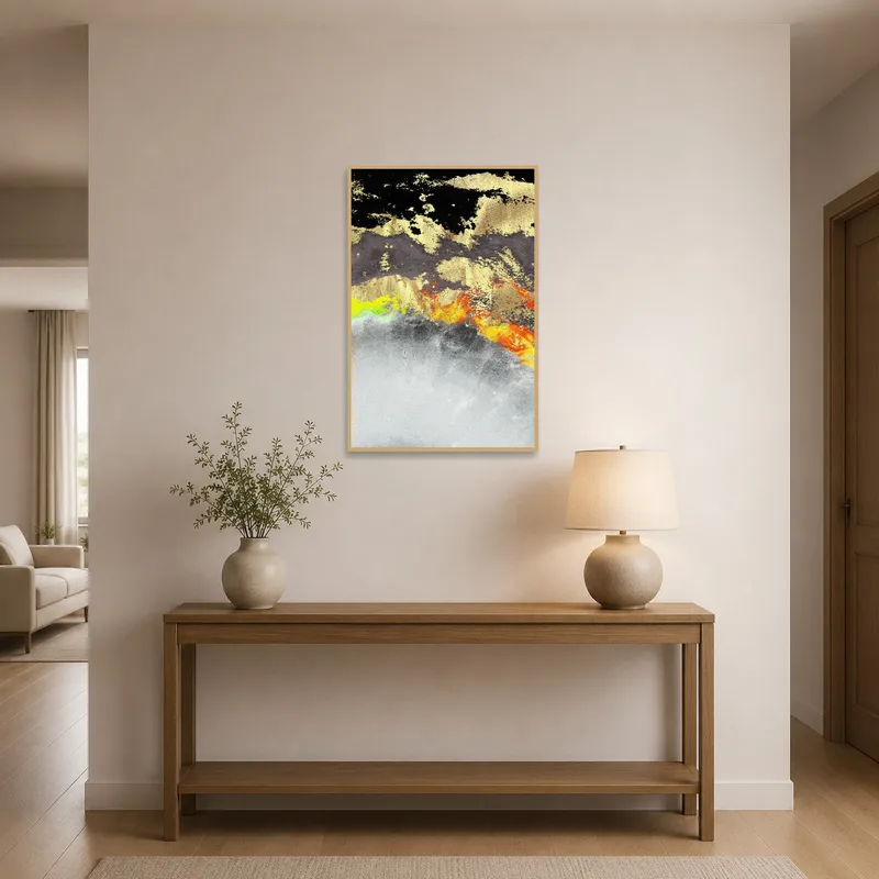 Gold and black artwork greets visitors in an elegant entrance hall.