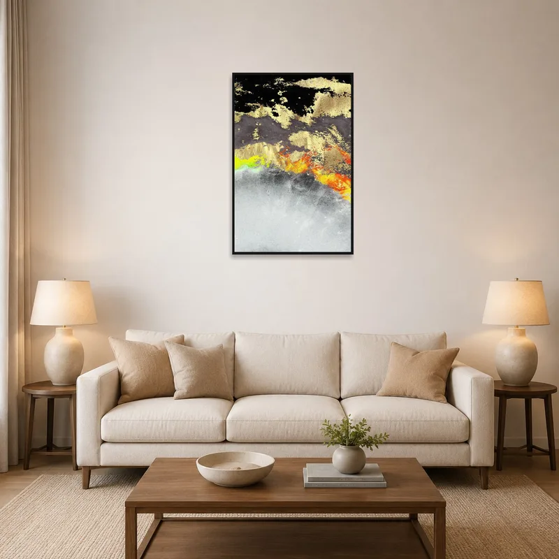 A vivid abstract in gold and black hangs in a stylish living room setting.