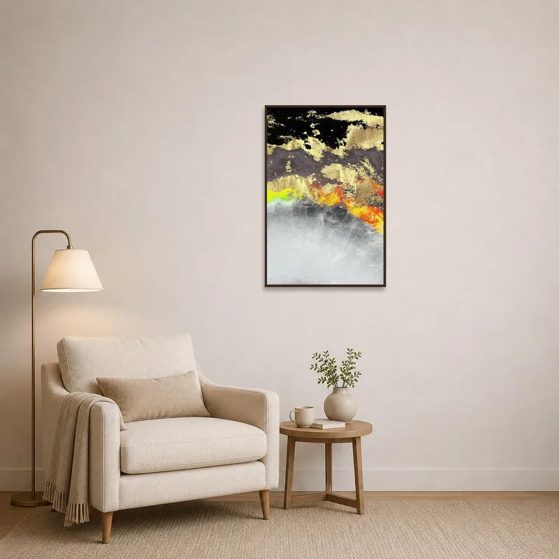 An abstract piece in gold and black adds flair to a cozy reading corner.