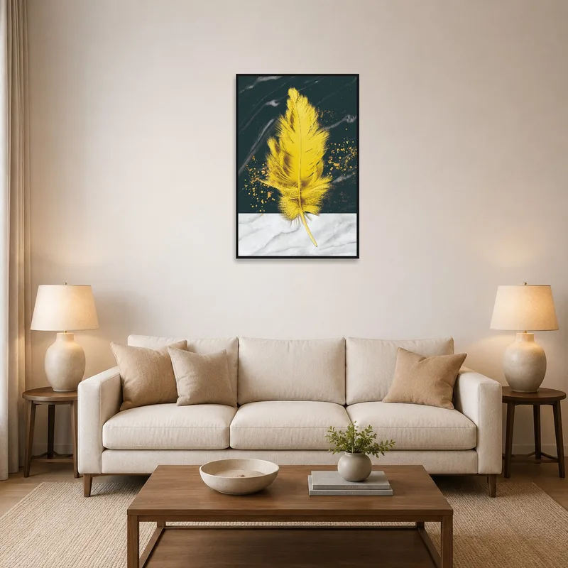 A vibrant yellow feather artwork on a marble and dark backdrop in a stylish living room.